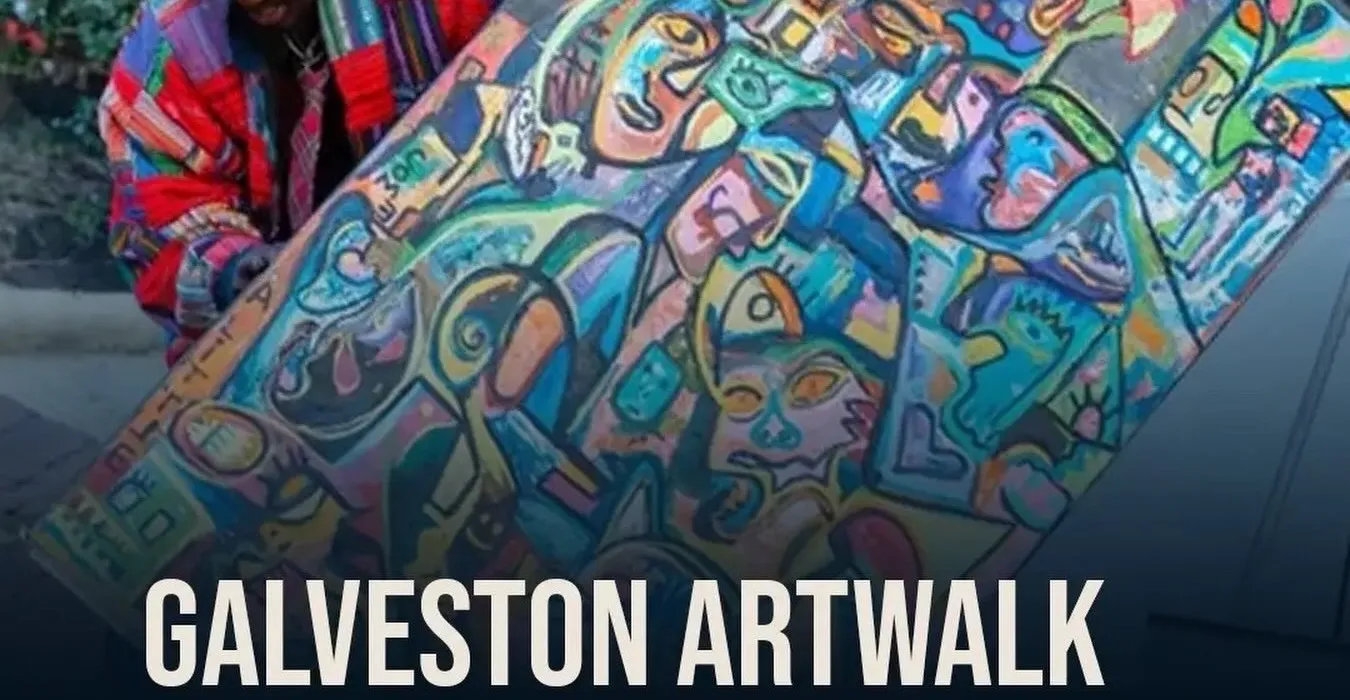 Ooowwee in a red beanie carrying a finished canvas of interlocking faces at the Galveston Artwalk