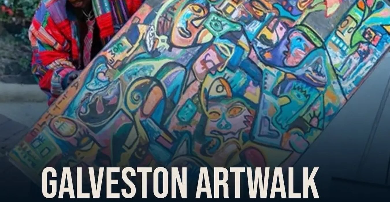 Ooowwee in a red beanie carrying a finished canvas of interlocking faces at the Galveston Artwalk